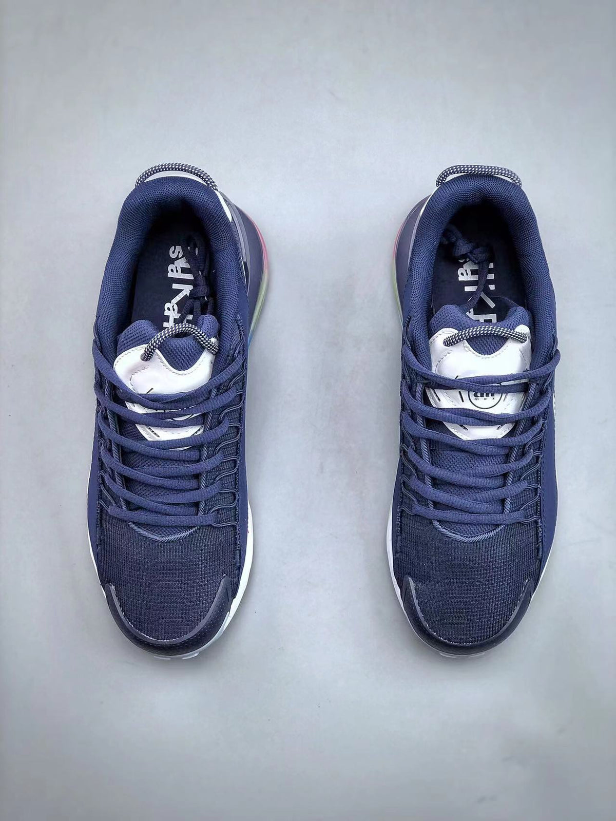 Navy and White Nike Air Max 270 React Sneakers - product image from the listing.