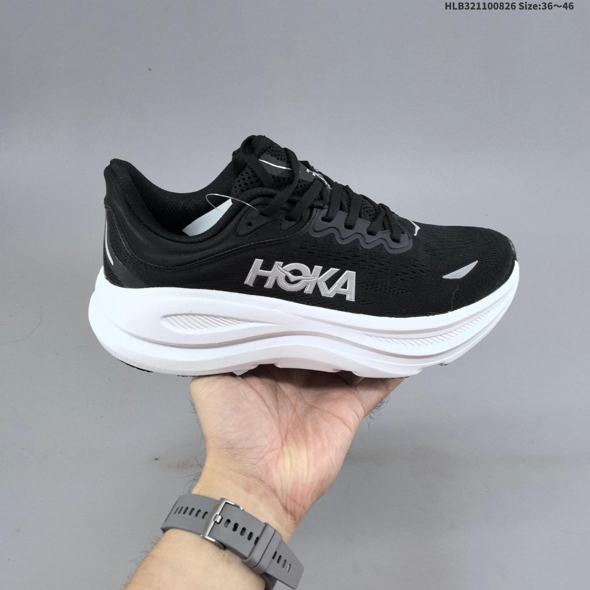 HOKA Bondi 9 Running Shoes in Black and White - product image from the listing.