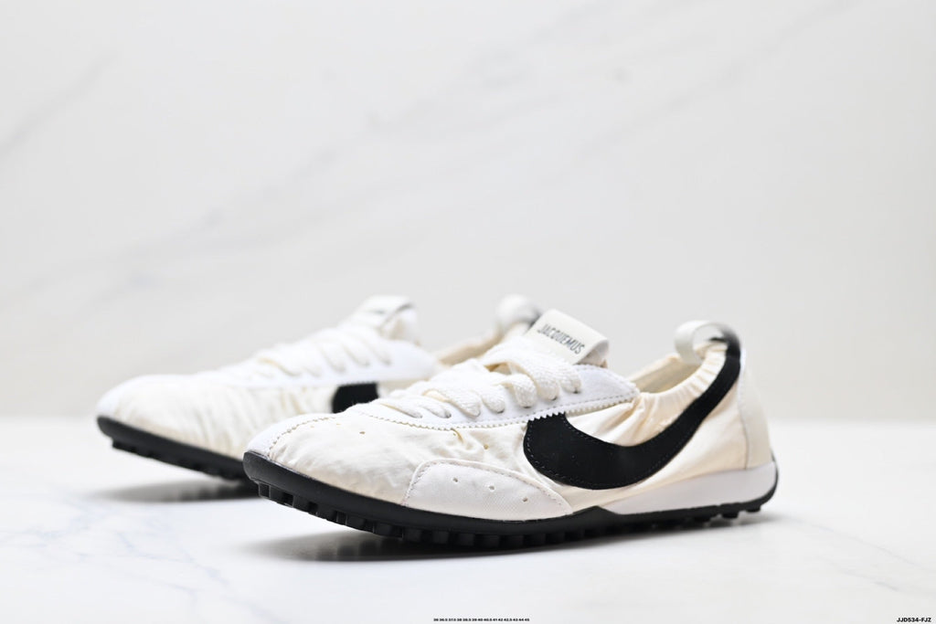 Jacquemus x Nike Jacumoon Low-Top Sneakers, in White and Black - product image from the listing.
