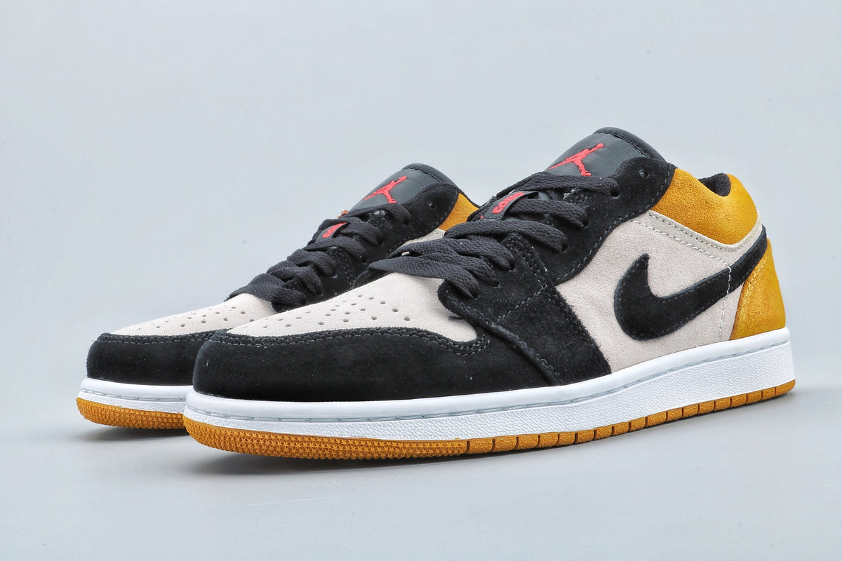 Yellow Toe Sneakers - Jordan 1 Low - product image from the listing.