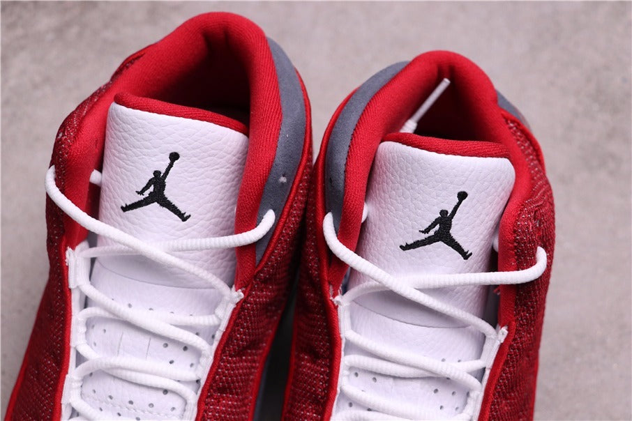 Air Jordan 13 Red Flint Sneakers 414571-600 - product image from the listing.