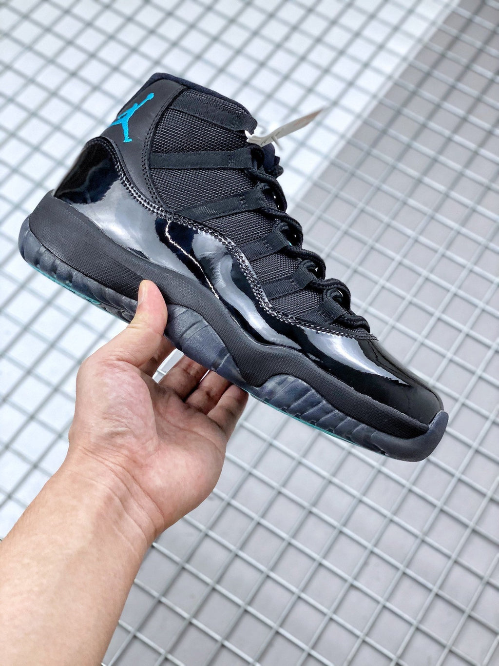 Air Jordan 11 Retro Gamma Black Sneakers 378037-006 - product image from the listing.
