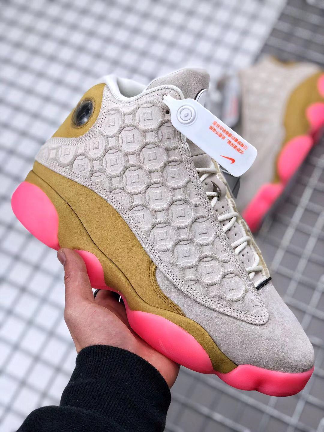 Air Jordan 13 CNY Sneakers in White, in Gold and Pink - product image from the listing.