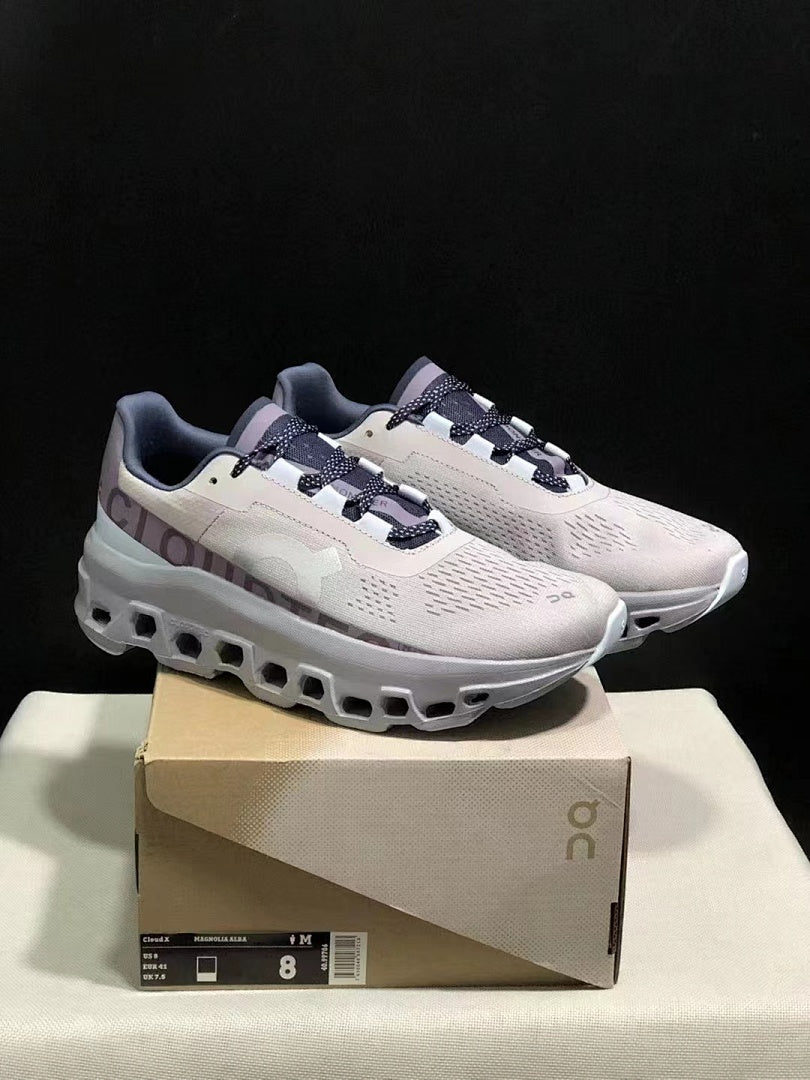 Gray and Purple On Cloudmonster Sneakers - product image from the listing.