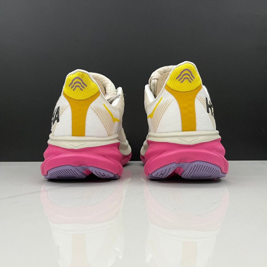 Ivory and Pink HOKA Clifton 9 Running Shoes - product image from the listing.