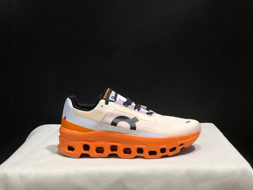 Yellow Tan and Orange On Cloudmonster Running Shoes - product image from the listing.