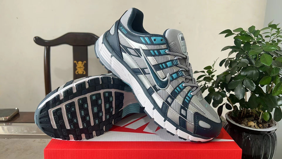 Nike P-6000 Sneakers in White Navy Turquoise CD6404-402 - product image from the listing.