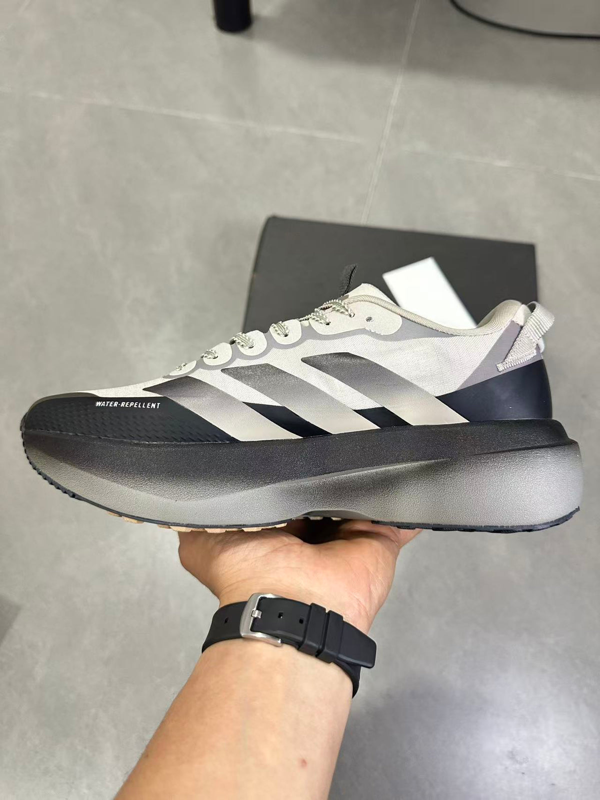 Adizero SL ATR Running Shoes in Black Brown KK0309 - product image from the listing.