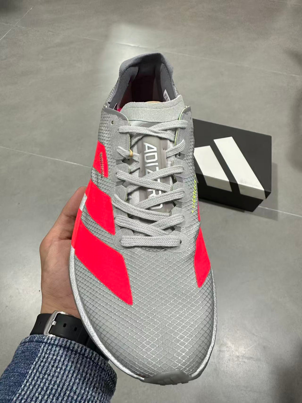 adidas Adizero Prime X 2.0 STRUNG Running Shoes in Grey Red - product image from the listing.