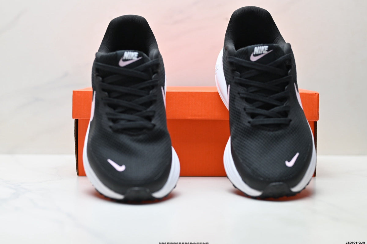 Nike Revolution 8 Running Shoes in Black and Pink - product image from the listing.