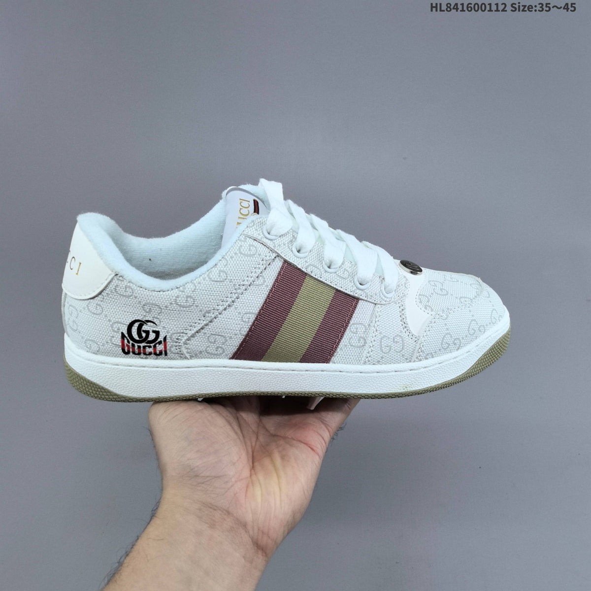 Gucci Screener Distressed Low-Cut Sneakers - product image from the listing.