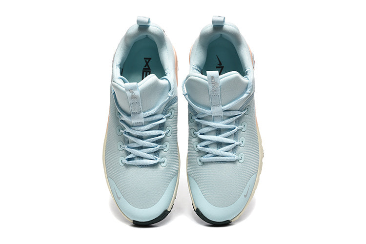 Blue and Peach Nike Free Metcon 5 Sneakers - product image from the listing.