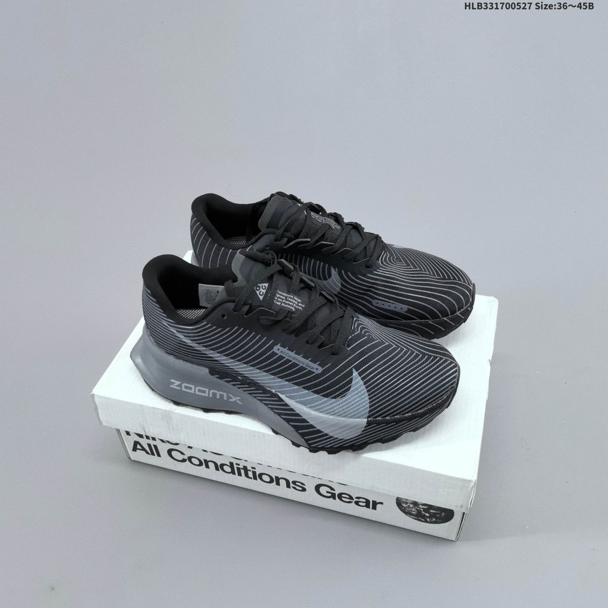 Black and Gray Nike ACG Ultrafly Trail Running Shoes - product image from the listing.