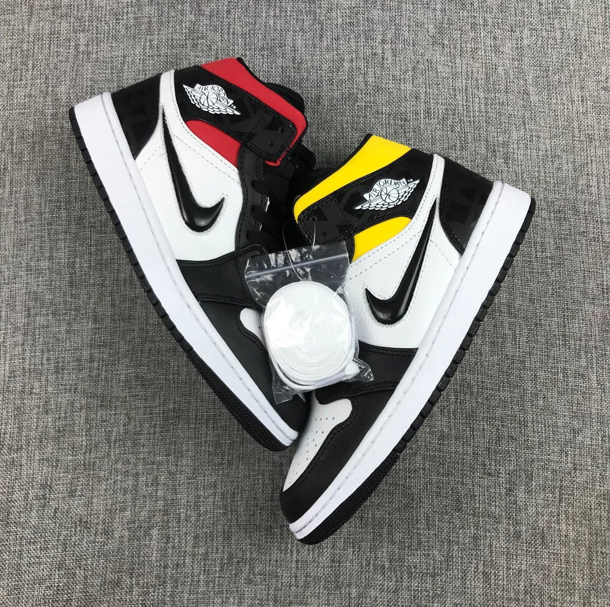 Quai 54 Sneakers Black Multi-Color - Air Jordan 1 Mid CJ9219-001 - product image from the listing.