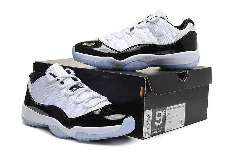 Air Jordan 11 Low Basketball Sneakers in White Black - product image from the listing.