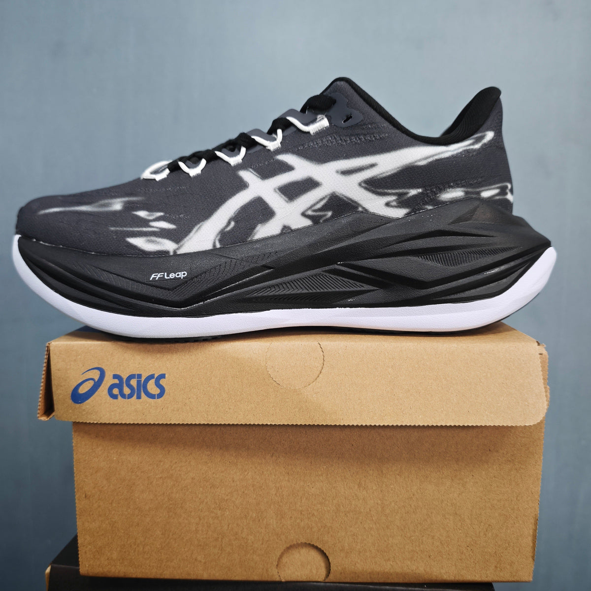 ASICS FF Leap Running Shoes in Black White 1013A177-100 - product image from the listing.
