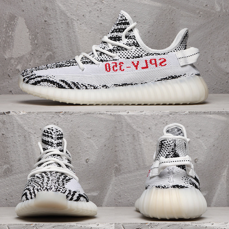 Yeezy 350 V2 Sneakers in Black and White Knit - product image from the listing.