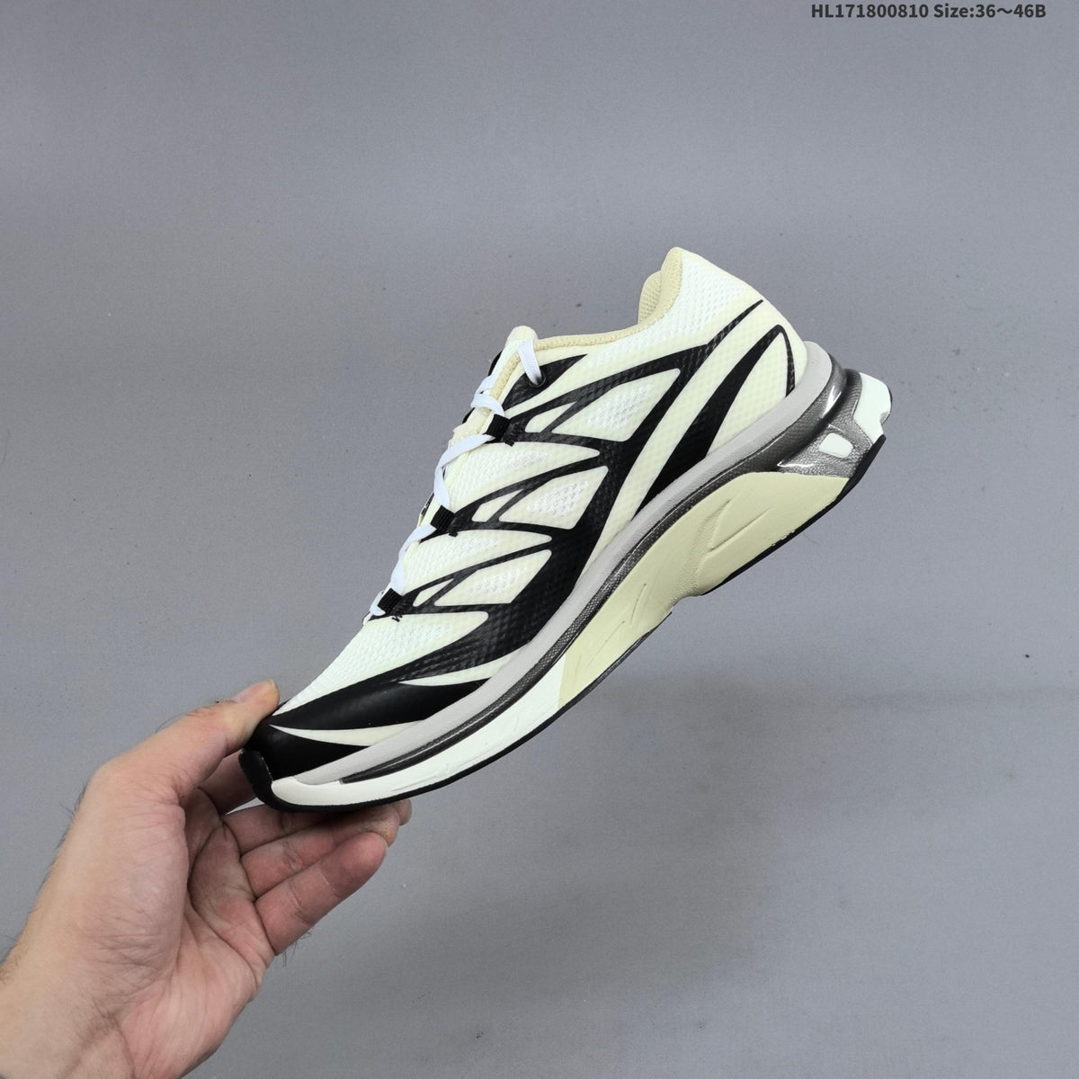 MM6 Maison Margiela x Salomon XT-4 Sneakers, in White and Black - product image from the listing.