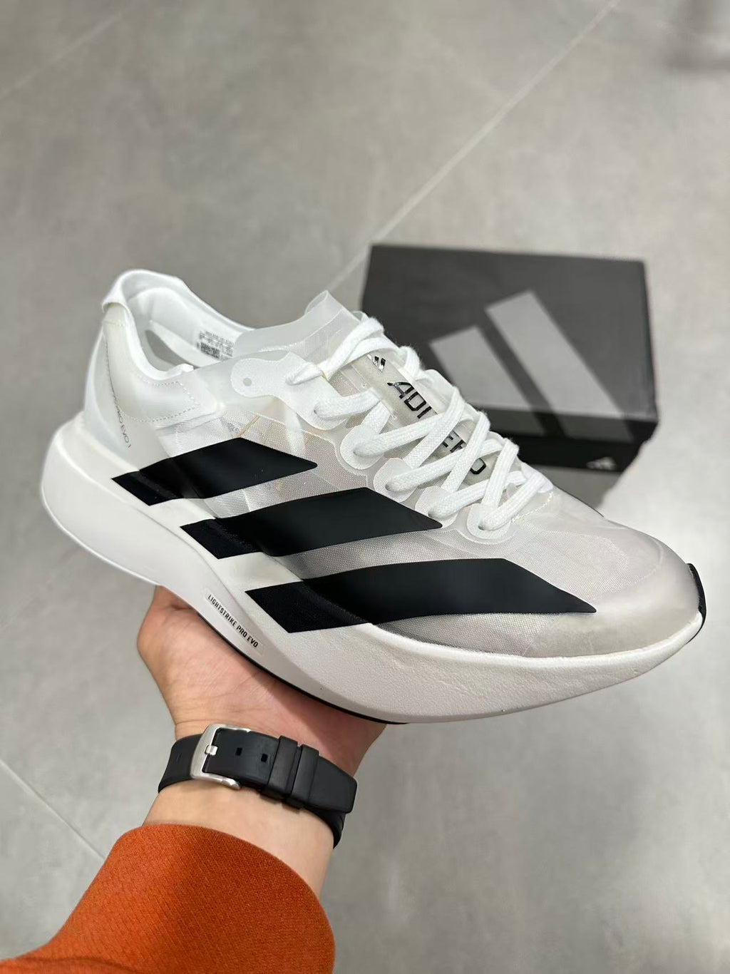 adidas Lightstrike Pro EVO Running Shoes in White Black - product image from the listing.