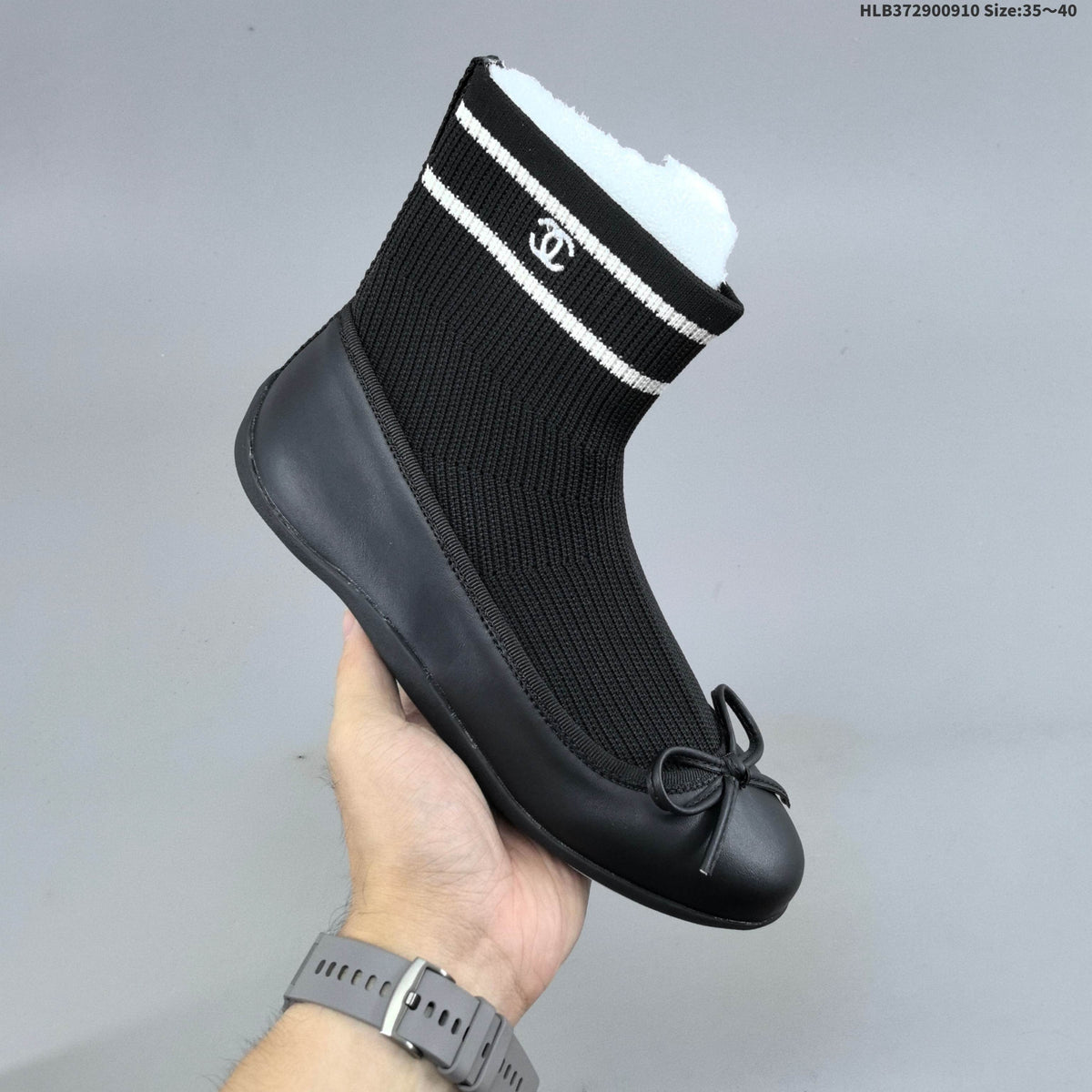 Chanel Sock Ballet Flats with Bow, in Black and White - product image from the listing.