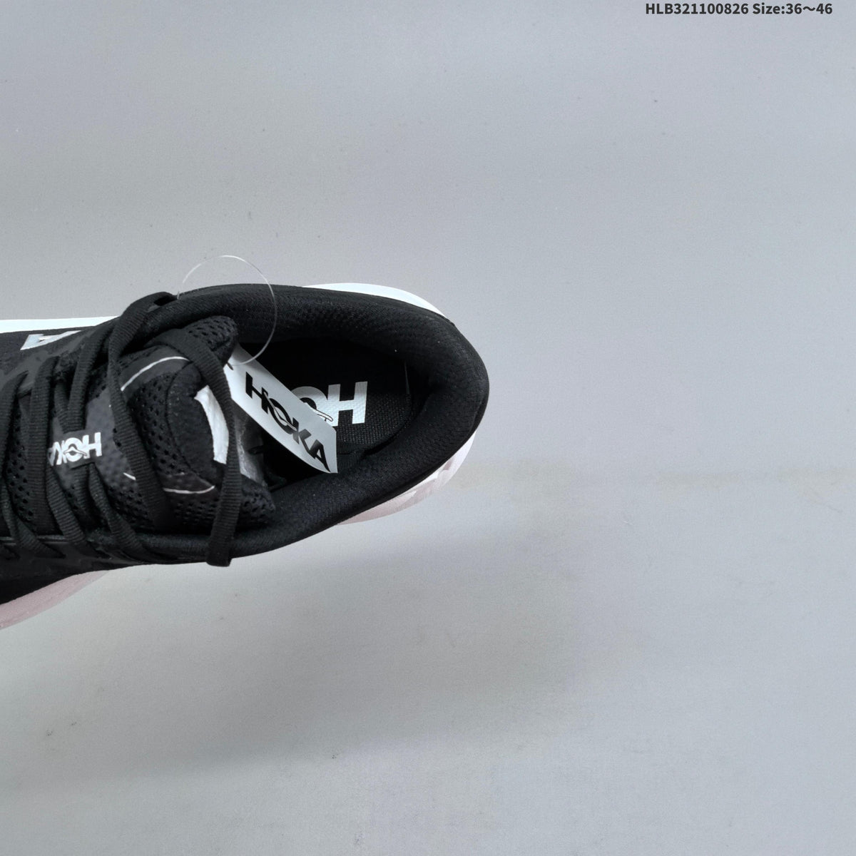 HOKA Bondi 9 Running Shoes in Black and White - product image from the listing.