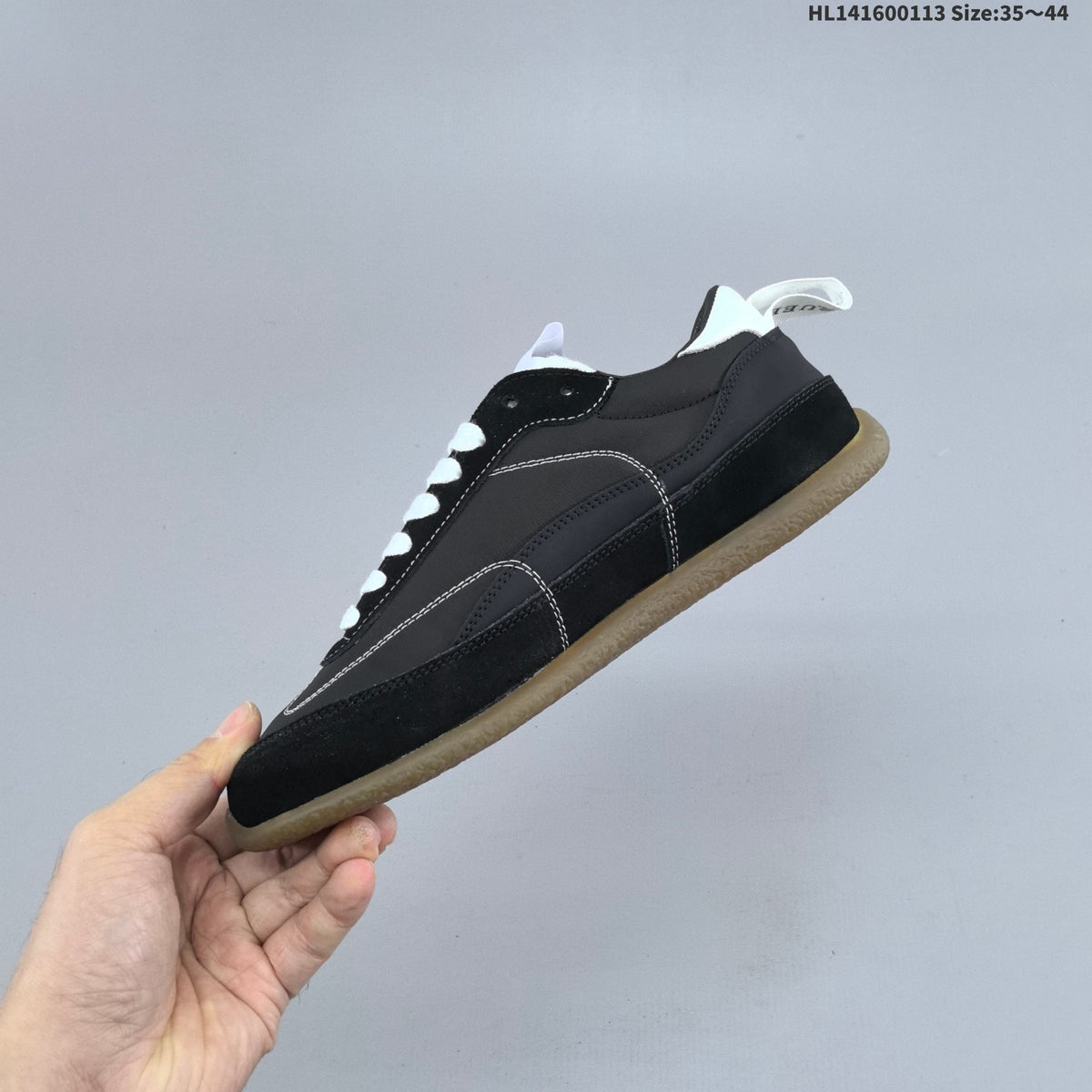 Miu Miu Tyre Low-Top Sneakers in Black or in White - product image from the listing.