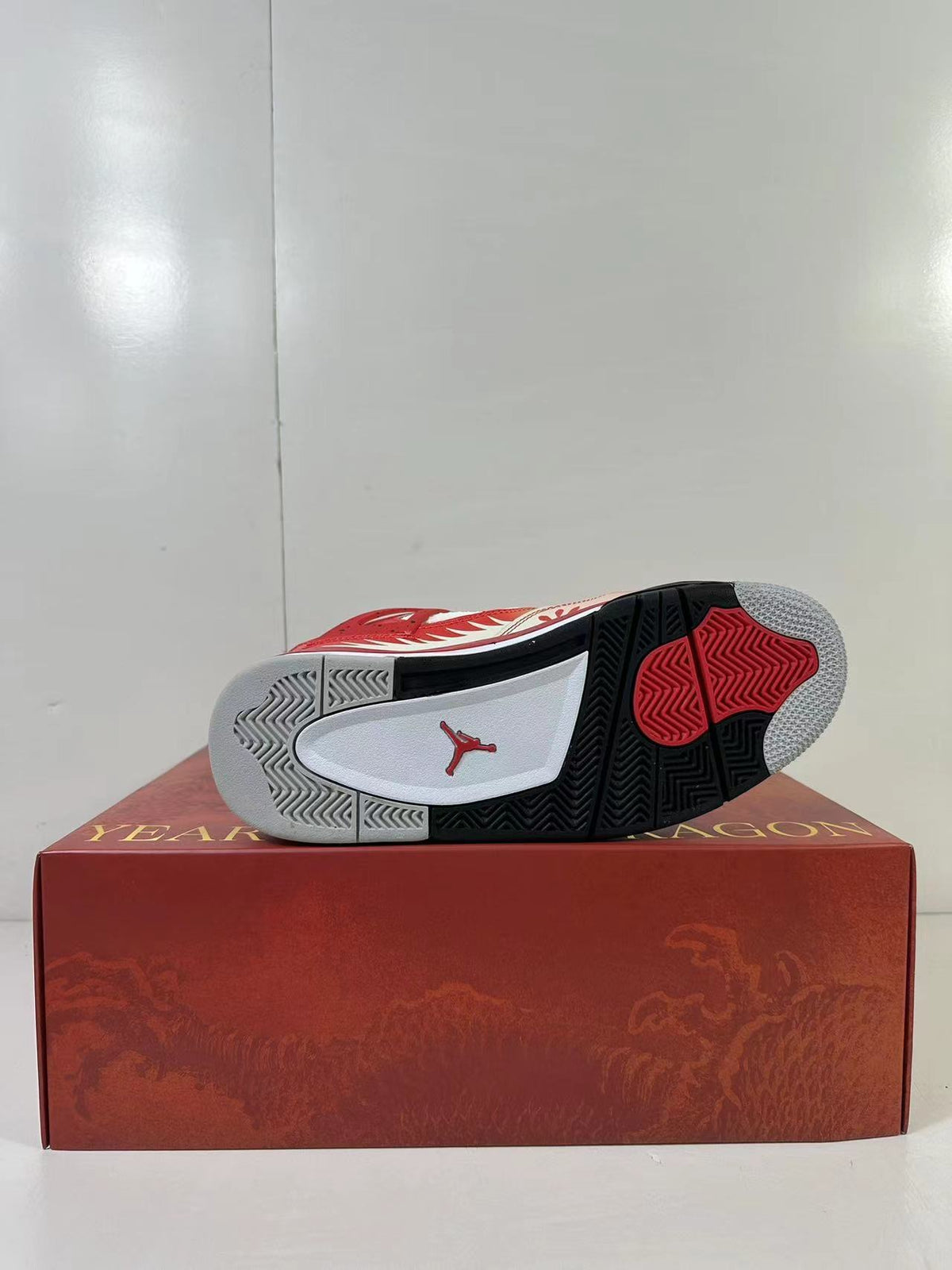 Air Jordan 4 Chinese New Year Red Blue Sneakers DH6927-161 - product image from the listing.
