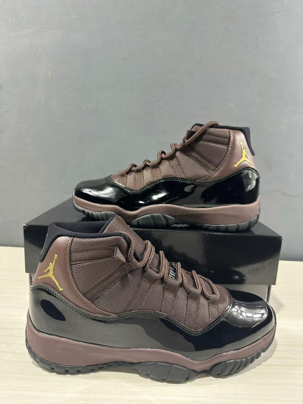 Air Jordan 11 Retro Black Bronze High-Top Sneakers - product image from the listing.