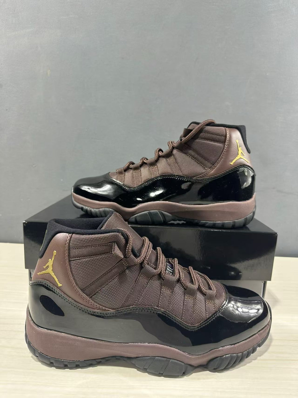 Air Jordan 11 Retro Black Bronze High-Top Sneakers - product image from the listing.