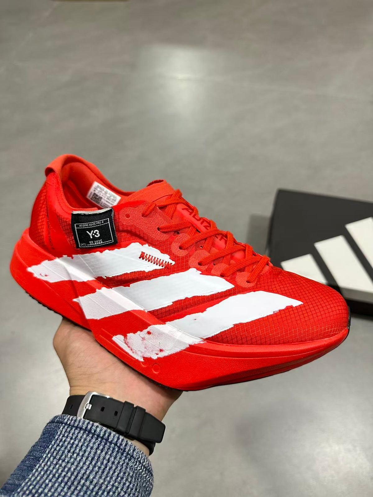 Adidas Adizero Adios Pro 4 Running Shoes in Red White JR6659 - product image from the listing.