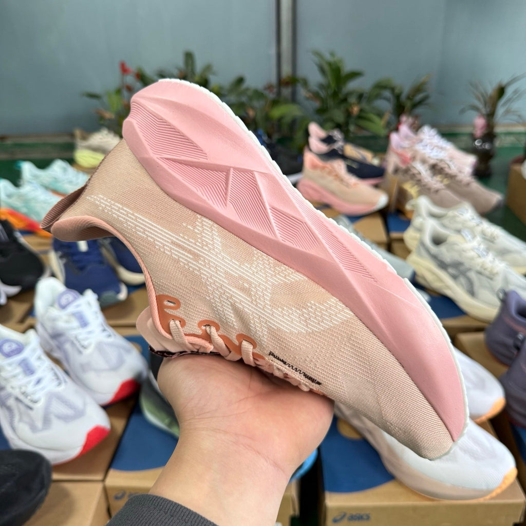 ASICS Novablast 5 LE Running Shoes in Pink - product image from the listing.