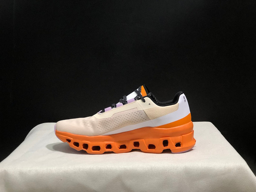 Yellow Tan and Orange On Cloudmonster Running Shoes - product image from the listing.