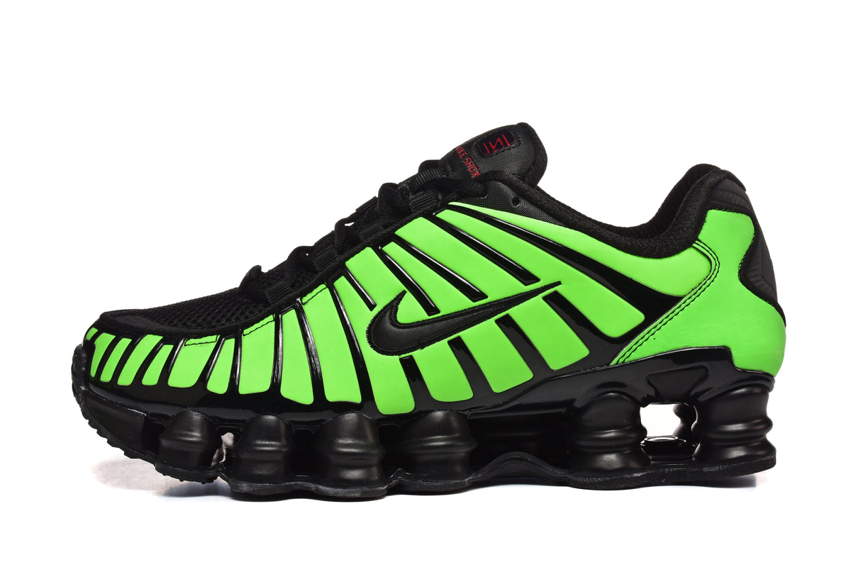 Black and Pink Nike Shox TL Sneakers - product image from the listing.