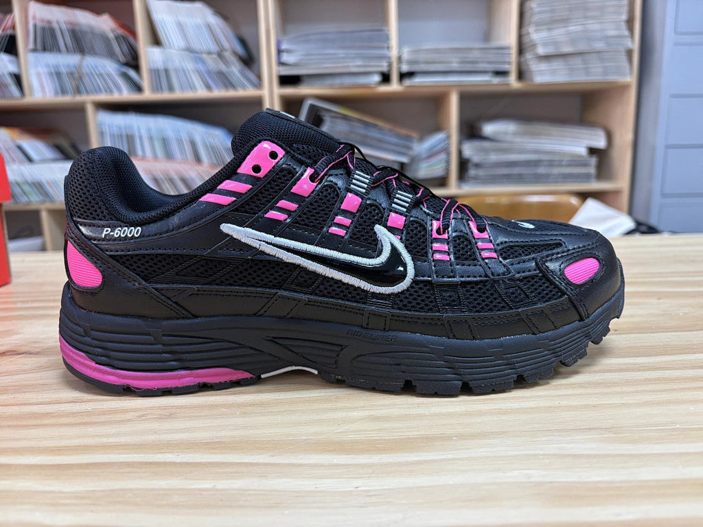 Nike P-6000 Sneakers in Black and Pink CD6404-600 - product image from the listing.