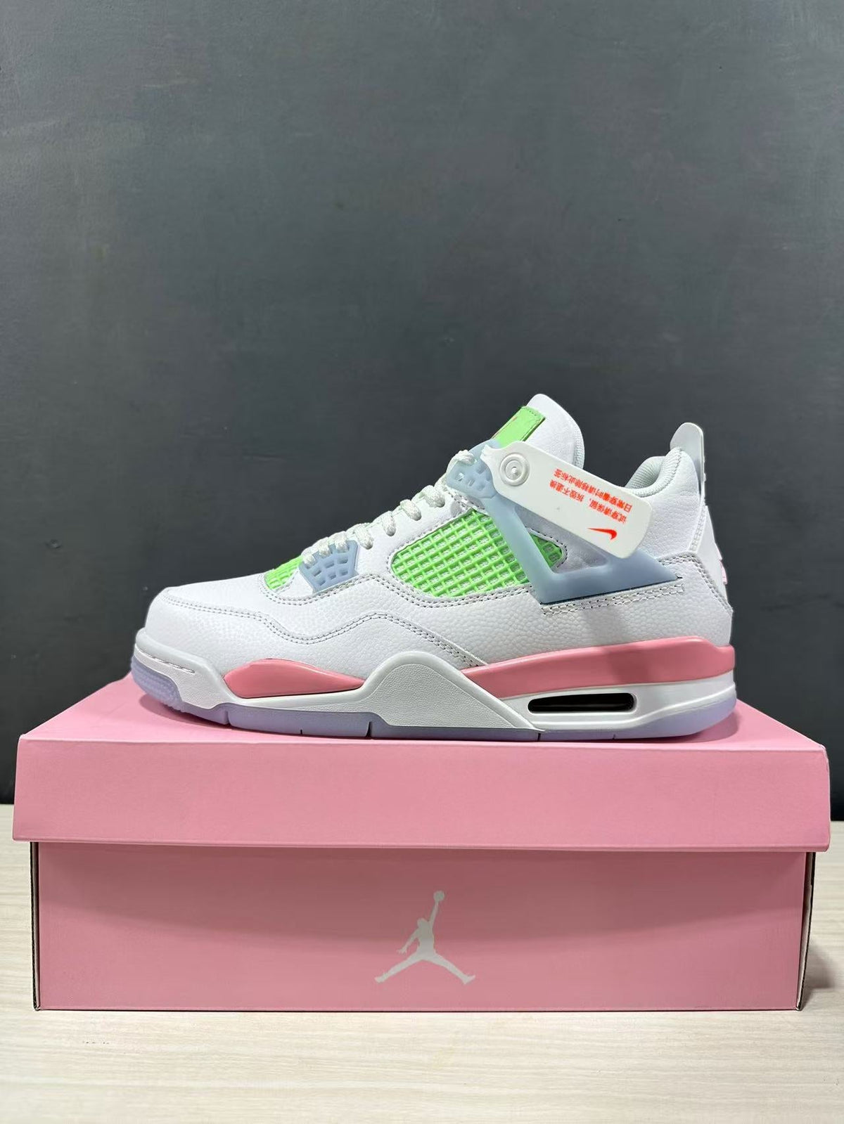 Air Jordan 4 Retro White Pink Green IB7068-100 - product image from the listing.