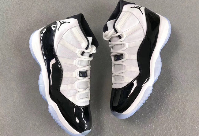 Air Jordan 11 Concord Black White Sneakers - product image from the listing.