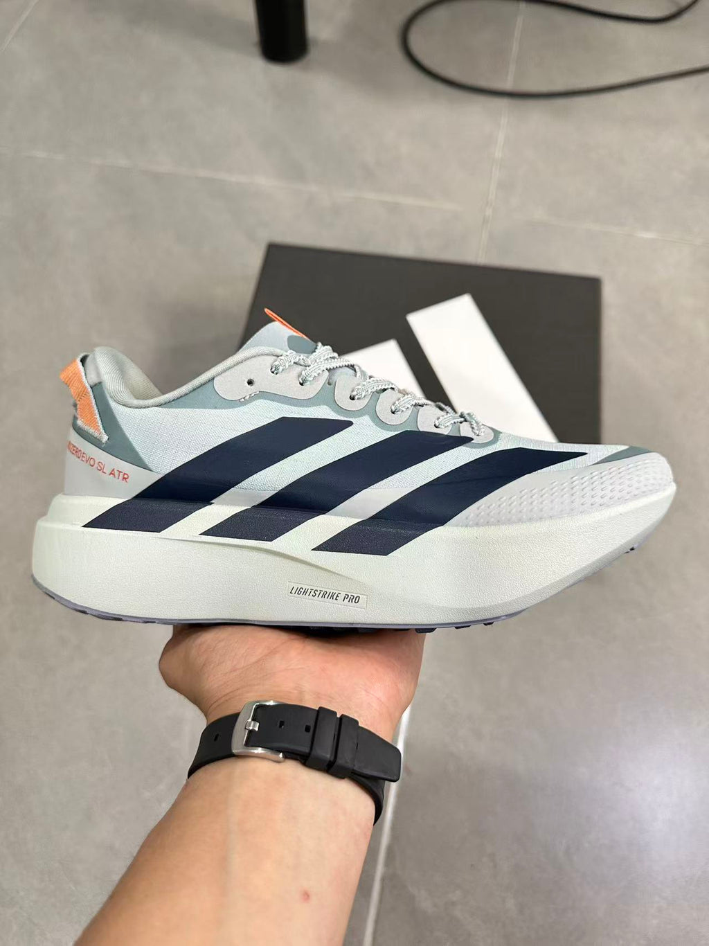 Adidas Adizero Evo SL Running Shoes in Blue Green - product image from the listing.
