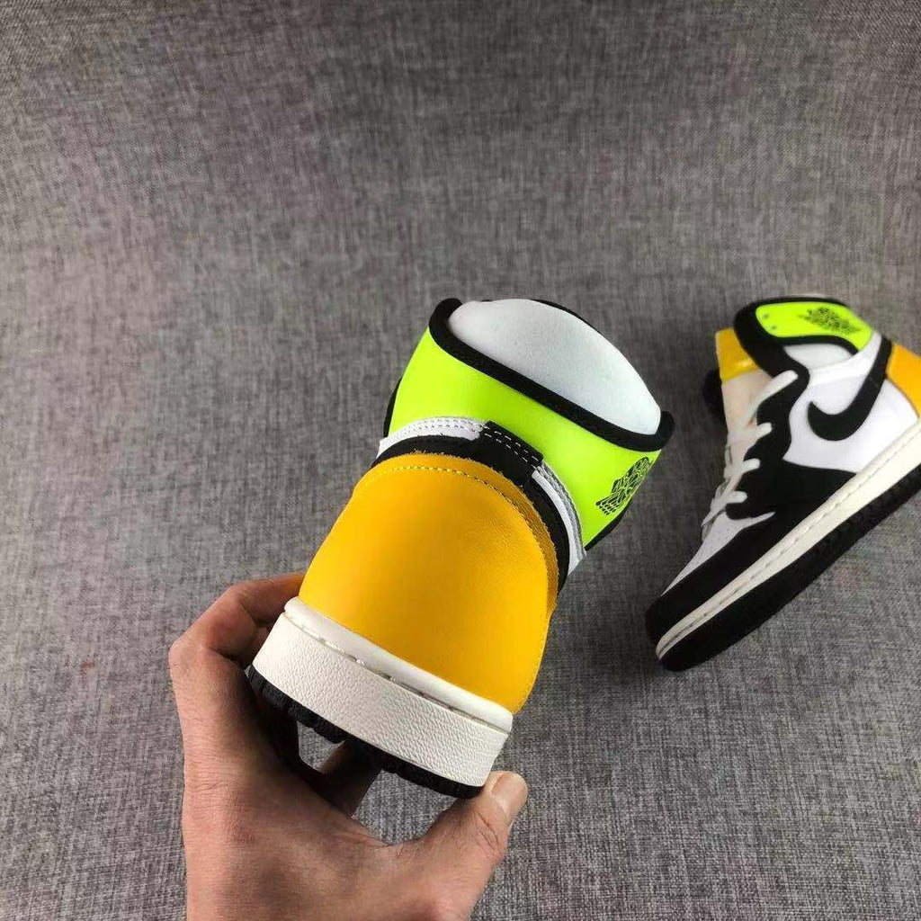 Air Jordan 1 High OG Volt Gold Sneakers Black White - product image from the listing.