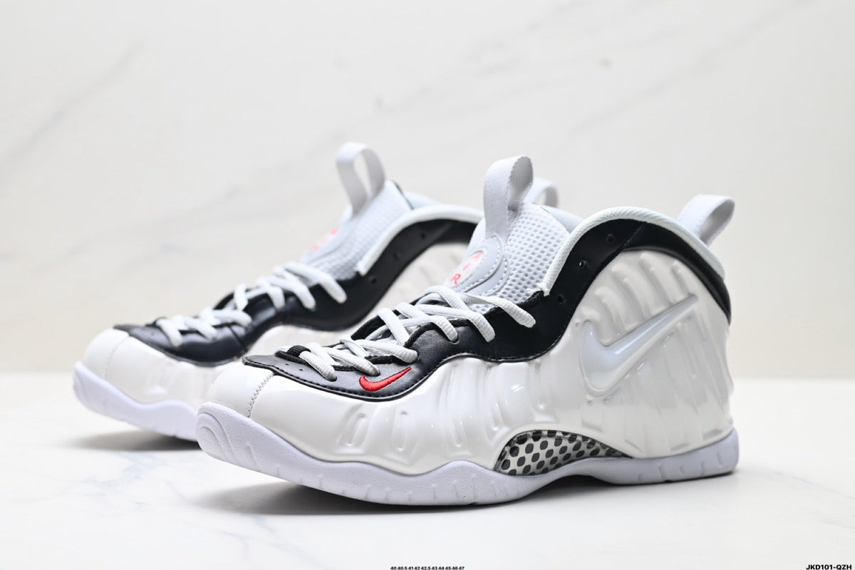 Nike Air More Uptempo Basketball Sneakers in White and Black - product image from the listing.