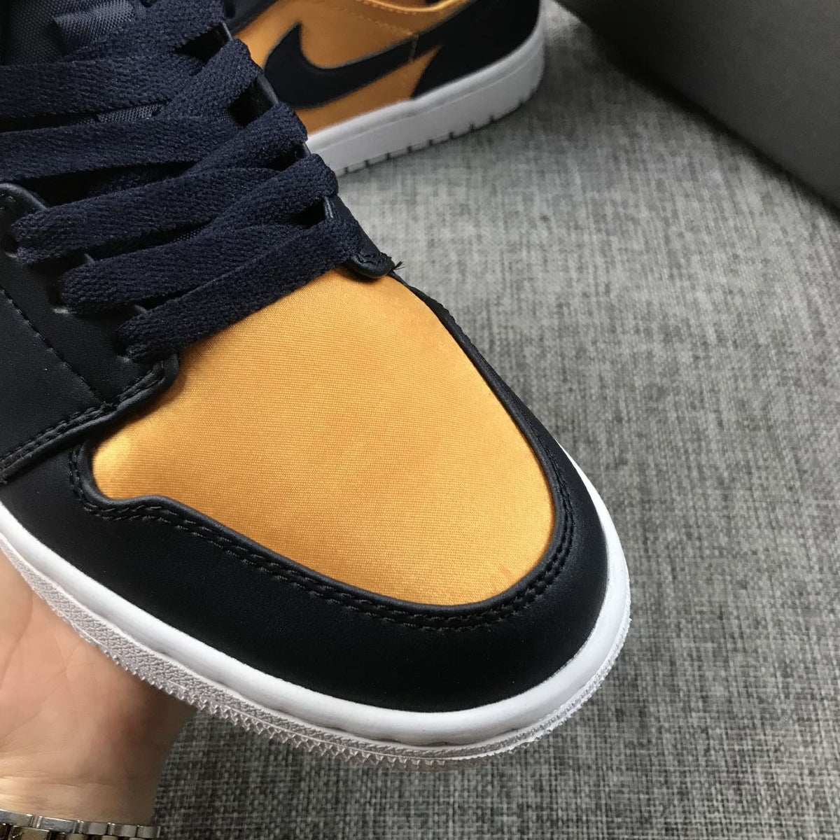 Air Jordan 1 Mid SE Sneakers in Black and Gold 852542-401 - product image from the listing.