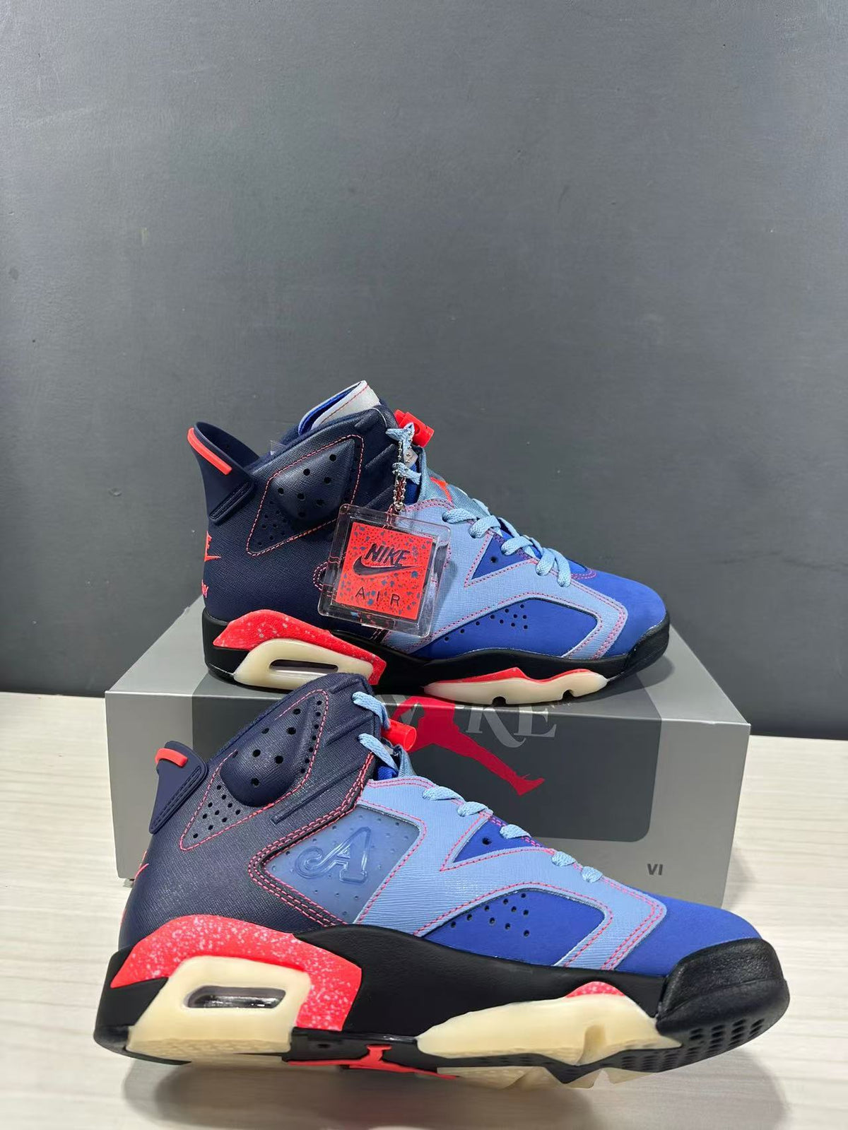 Jordan 6 Retro High-Top Sneakers in Blue IQ5706-400 - product image from the listing.