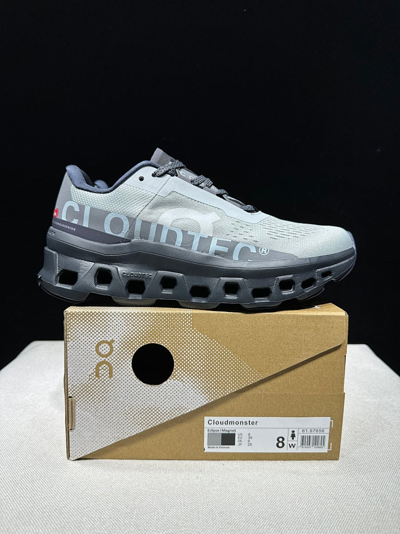 On Cloudmonster Shoes for Running in Eclipse and Magnet - product image from the listing.
