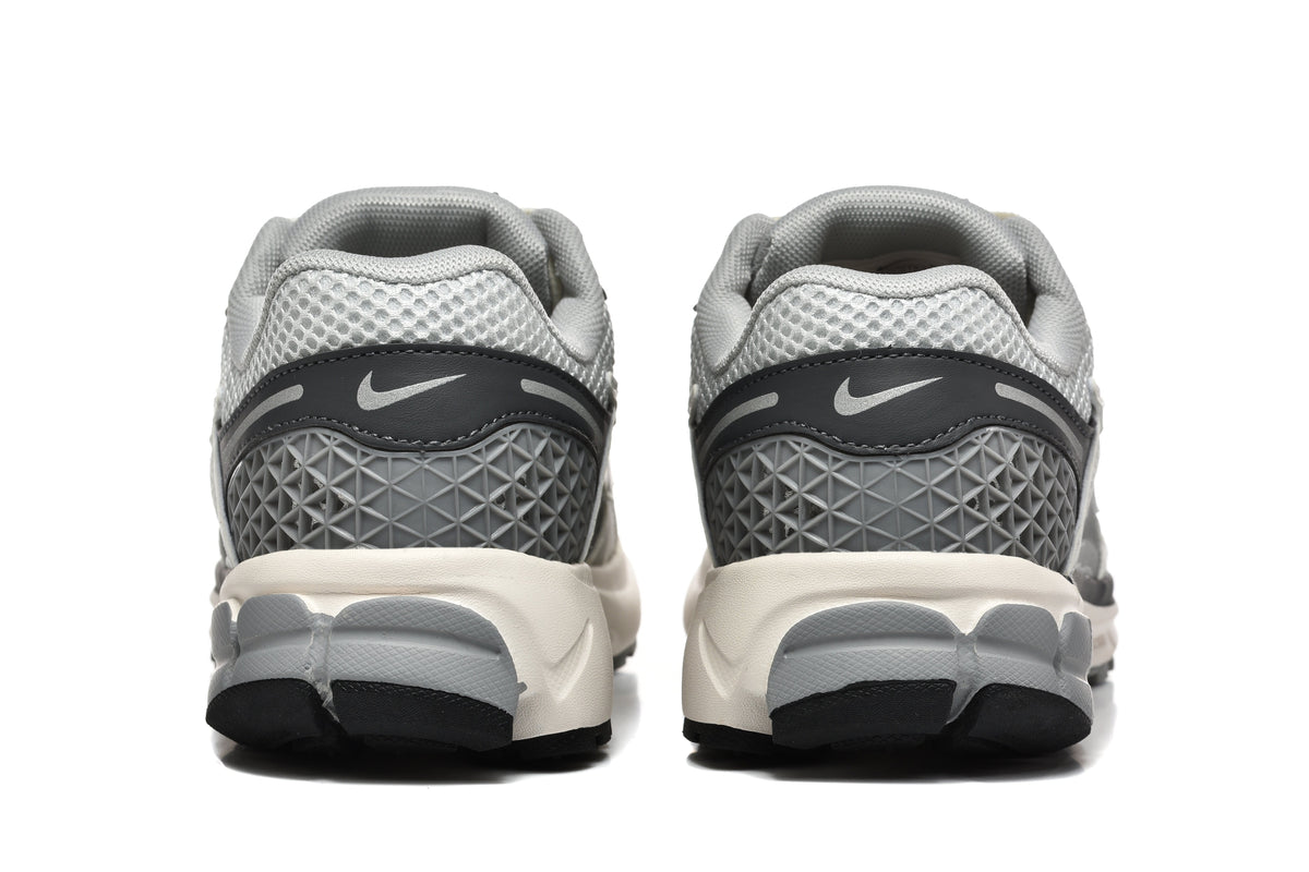 Grey and White Nike Zoom Vomero 5 Sneakers - product image from the listing.