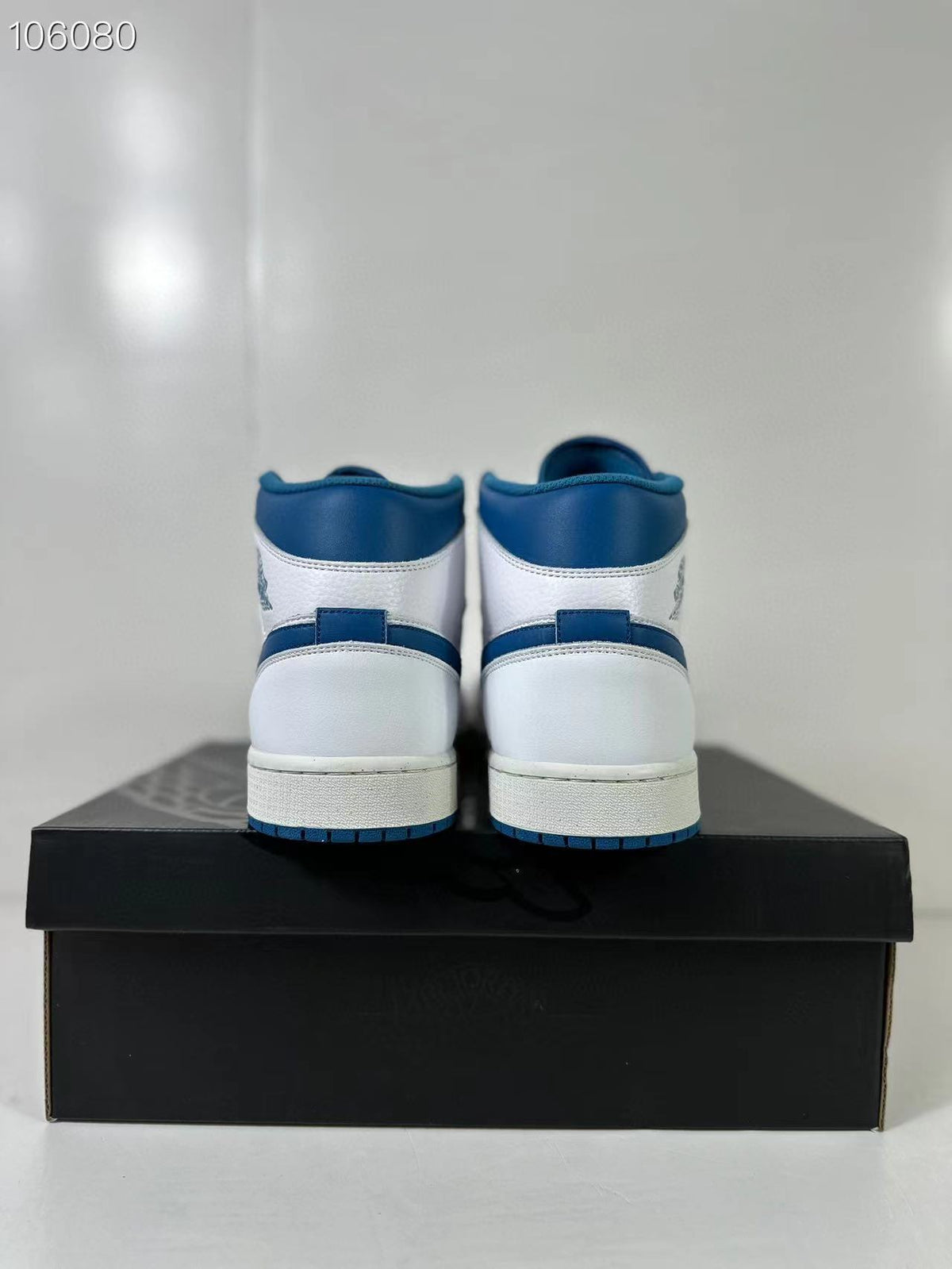 Air Jordan 1 Mid White Blue FN5215-141 Sneakers - product image from the listing.