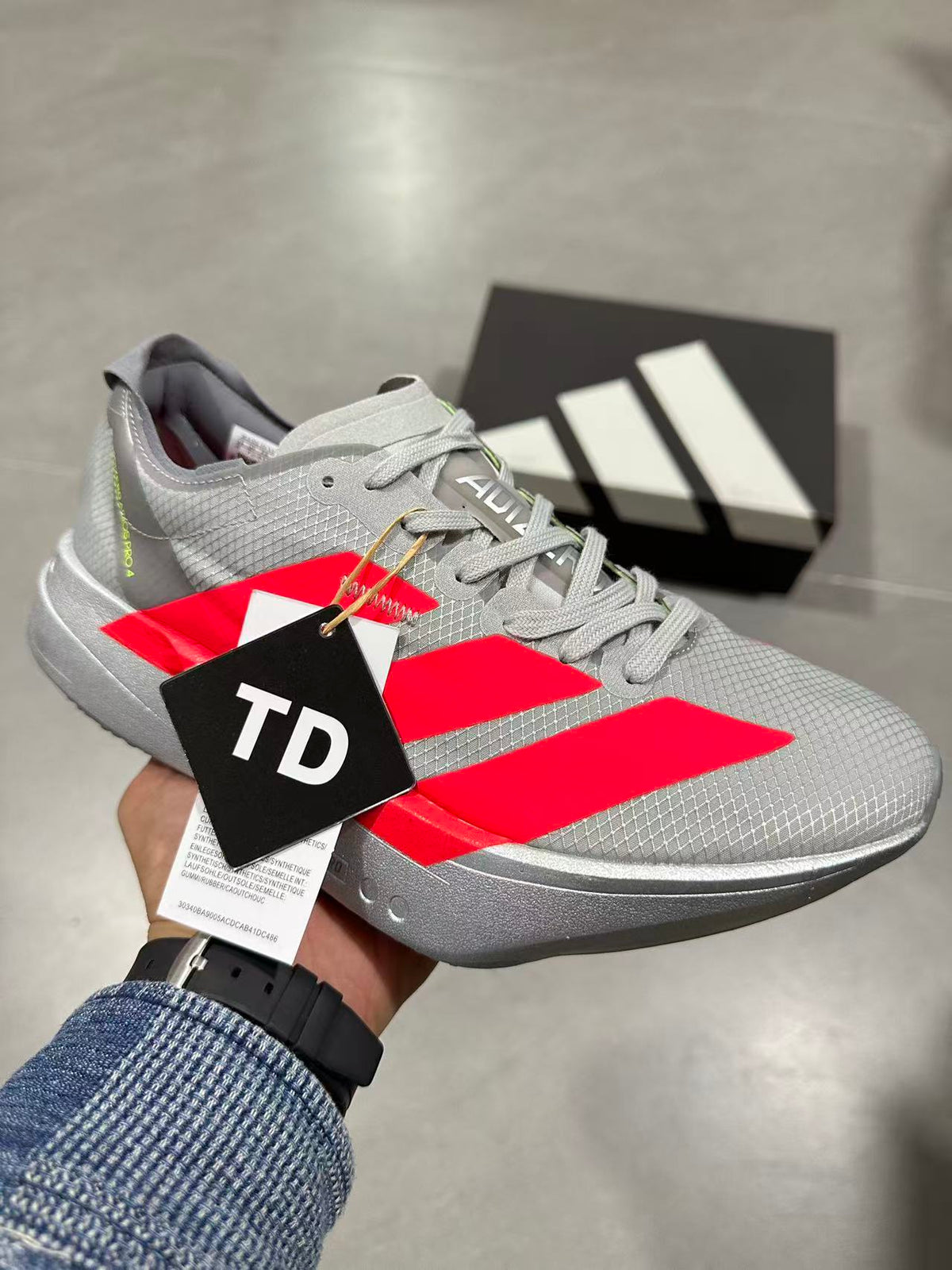 adidas Adizero Prime X 2.0 STRUNG Running Shoes in Grey Red - product image from the listing.