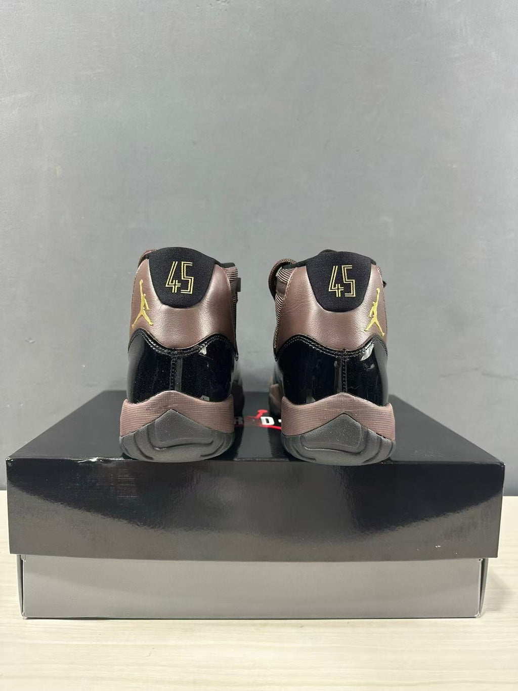 Air Jordan 11 Retro Black Bronze High-Top Sneakers - product image from the listing.