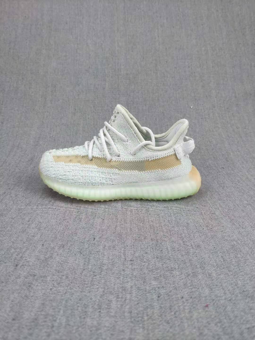 Yeezy Boost 350 V2 Kids Sneakers, in Light Neutral - product image from the listing.
