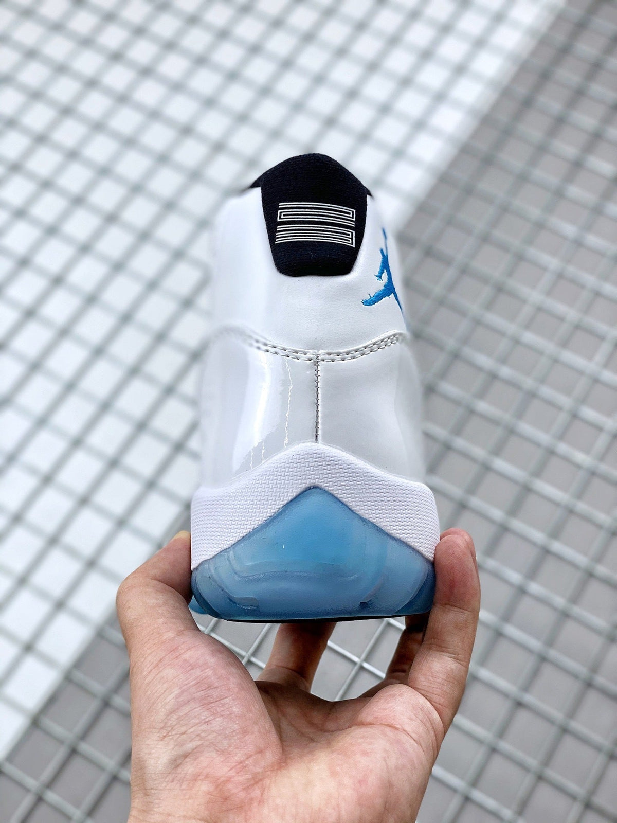 Jordan 11 Legend Blue Sneakers in White Blue 378037-117 - product image from the listing.