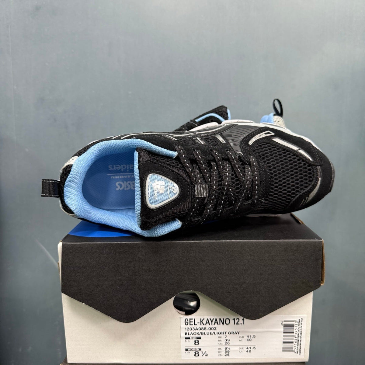 ASICS GEL-KAYANO 12.1 Running Sneakers in Black Blue - product image from the listing.