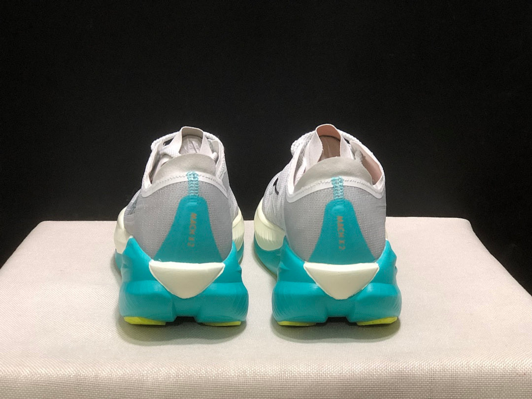 HOKA Mach X 2 Running Shoes, in White and Turquoise - product image from the listing.